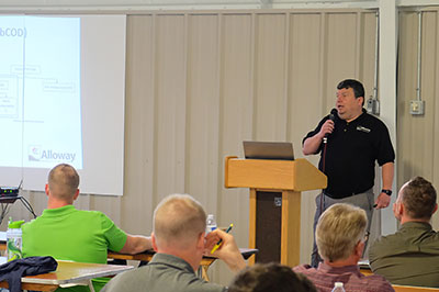 Rad Bolek Speaking at a Conference Photo